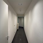 Gang zur Küche und WCs